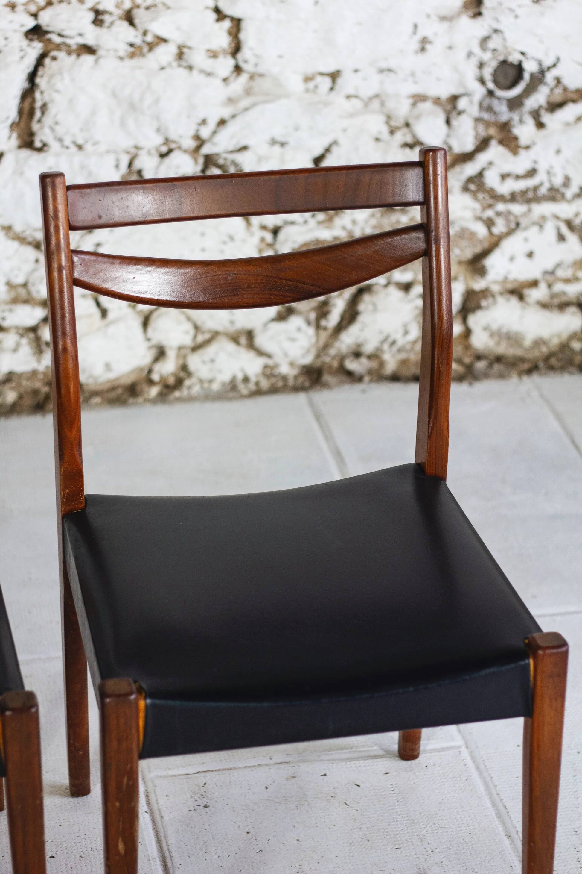 4 vintage Scandinavian chairs in teak and imitation leather, 1960