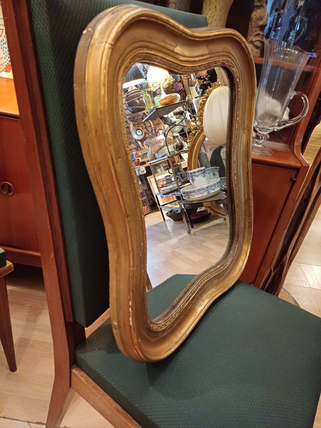 Antique golden quadrilobe-shaped mirror