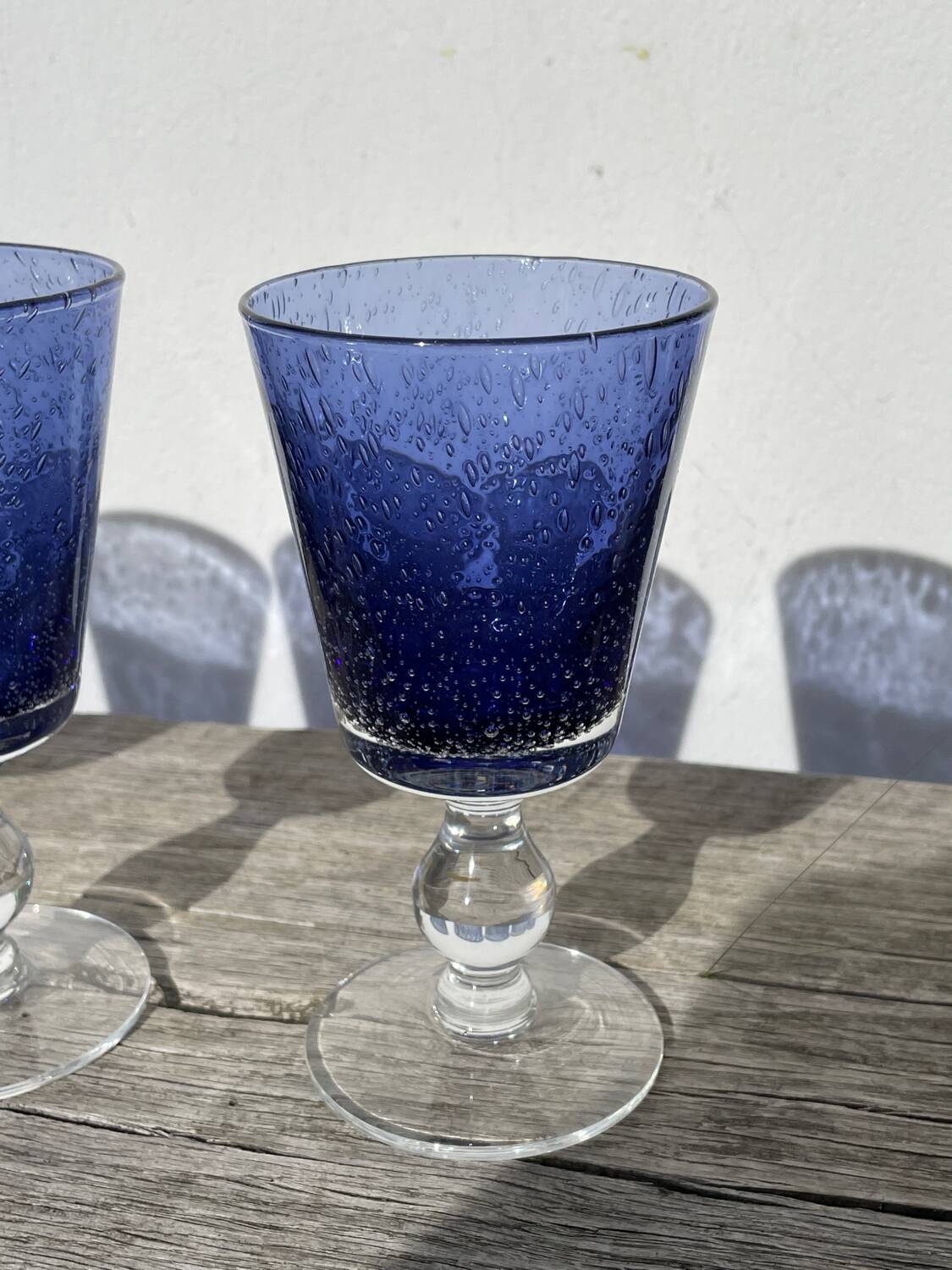 Set of 5 blue bubble stemmed glasses
