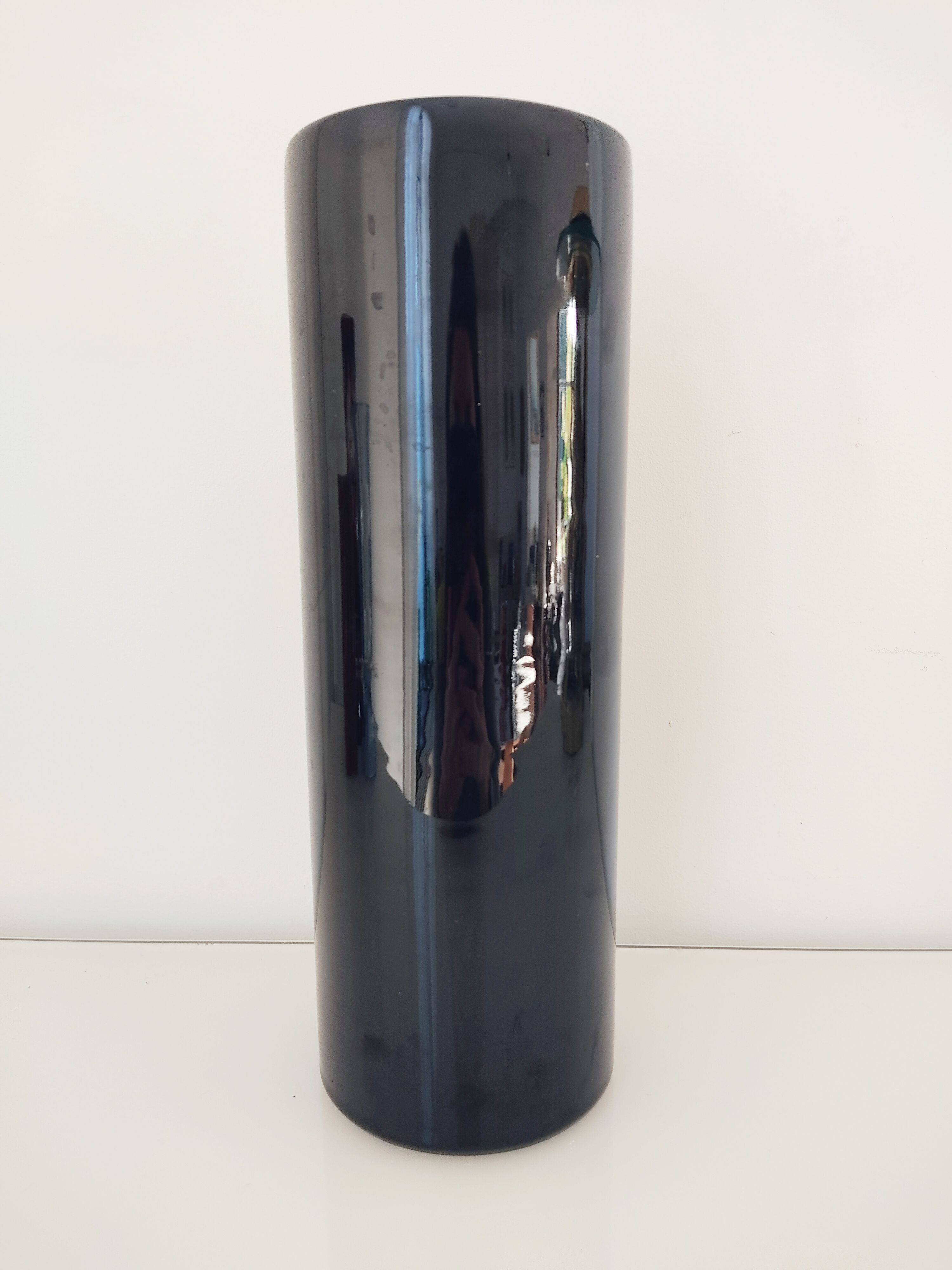 Dark blue ceramic roller vase
