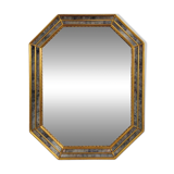 Octagonal mirror in Venetian style with gold-rimmed parecloses