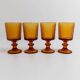 Lot of 4 vintage wine glasses from the 1970s, textured amber on a stem, design by Timo Sarpaneva for Iittala.