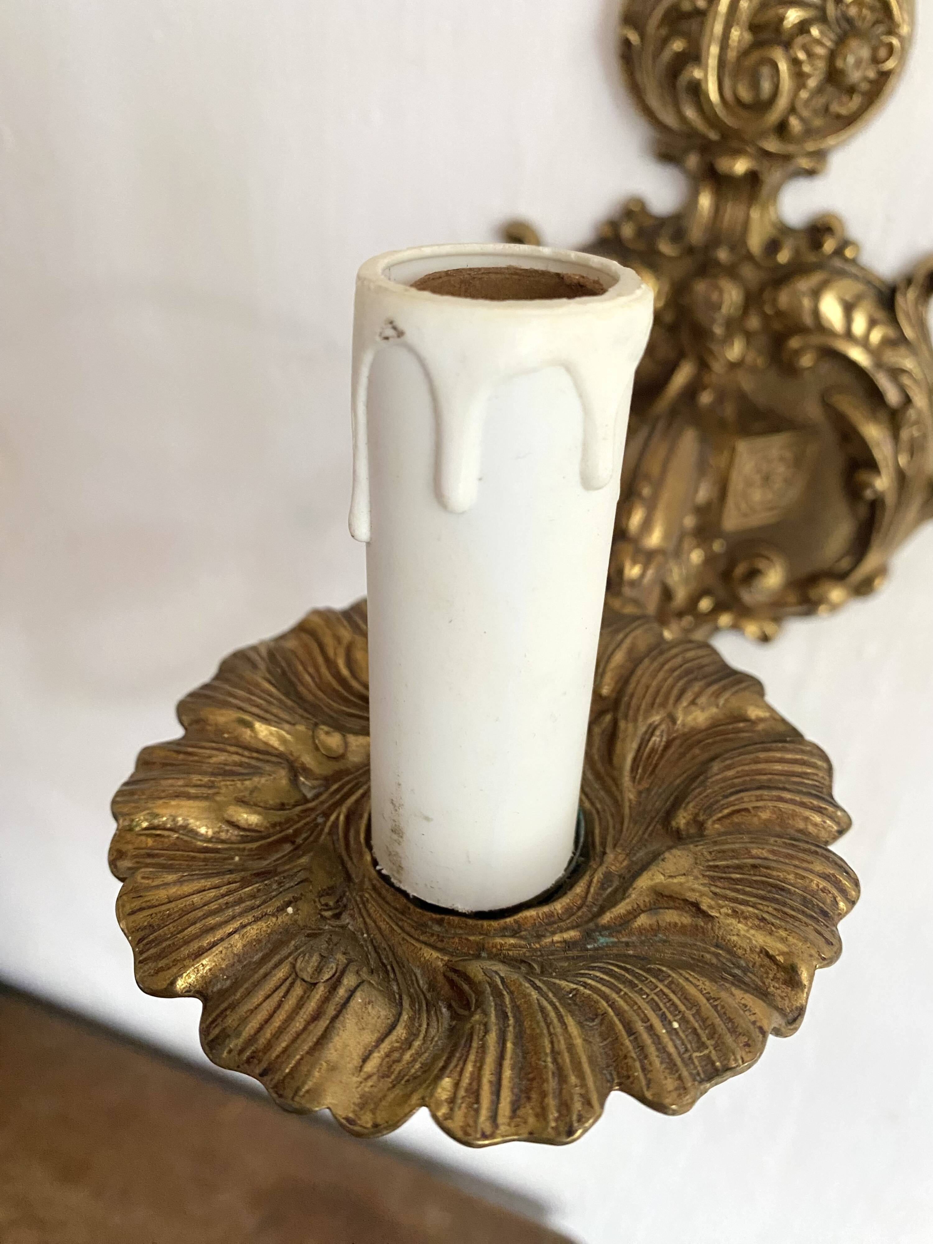 Pair of 1-light gilded brass wall lights