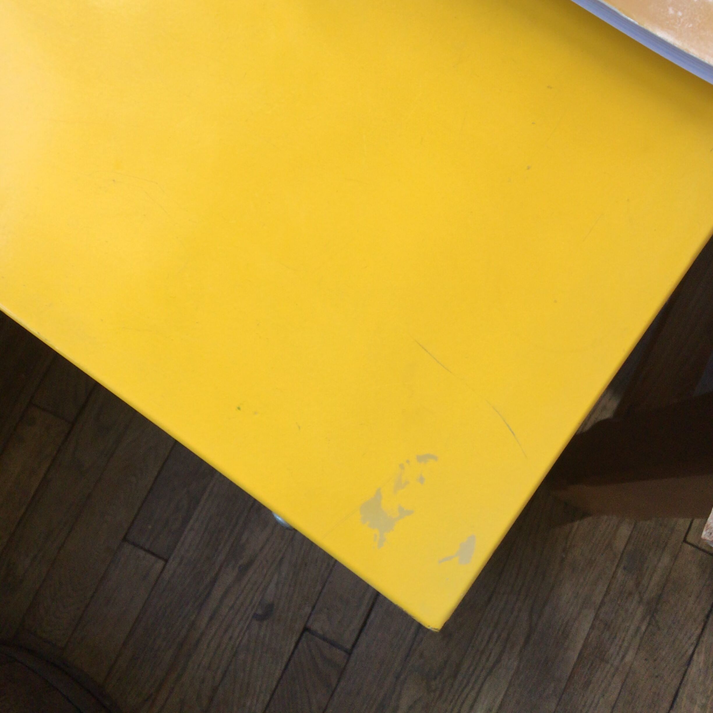 Small yellow metal desk