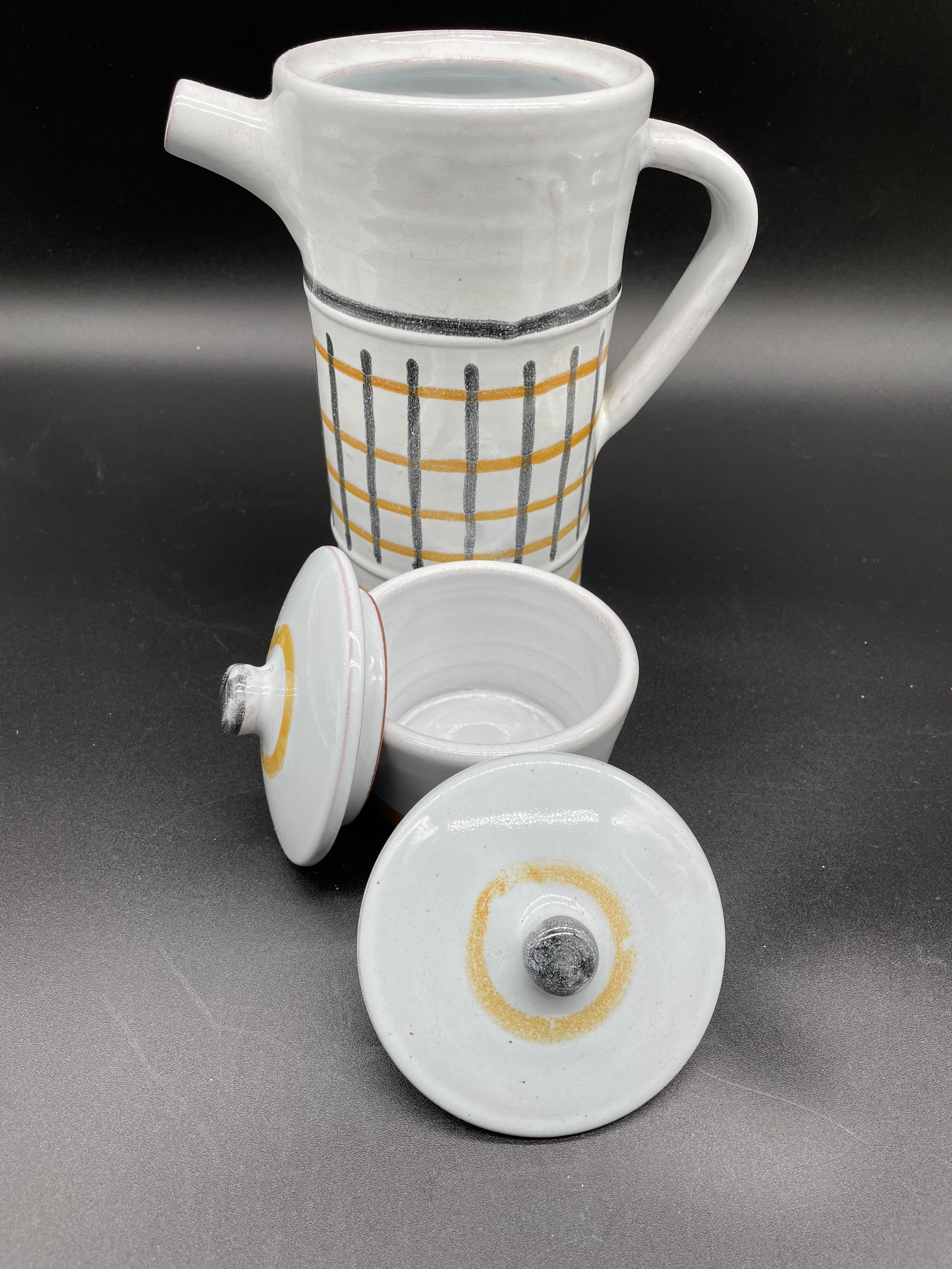 Vintage 1960s coffee service in ceramic, modernist design.