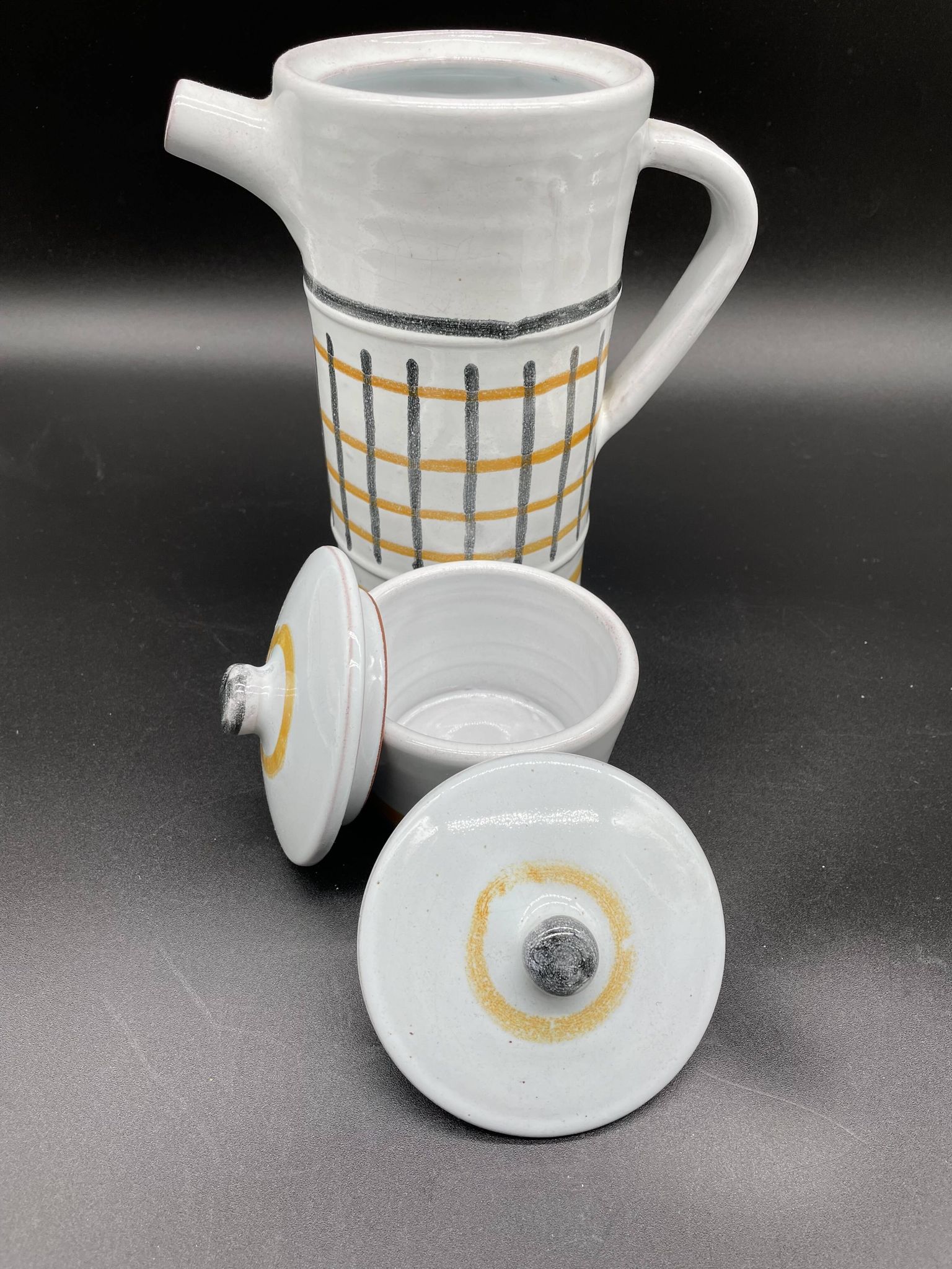 Vintage 1960s coffee service in ceramic, modernist design.