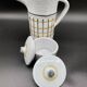 Vintage 1960s coffee service in ceramic, modernist design.