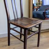 Pair of 1930s bistro chairs with patinated wood.