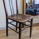 Pair of 1930s bistro chairs with patinated wood.