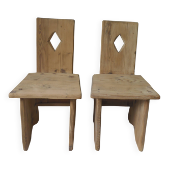 2 vintage brutalist style chairs in pitch pine with a waxed finish.