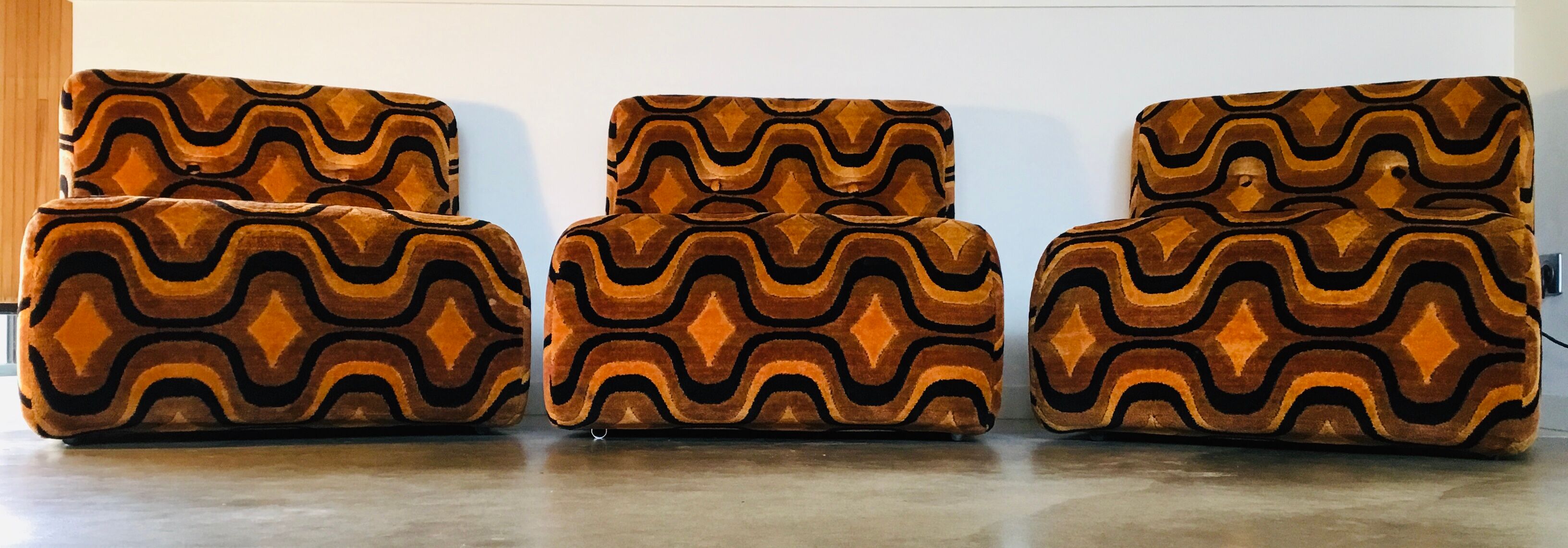 Vintage 1970s orange geometric patterned space-age armchair