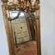 Miroir avec un ange en bois doré et stuc 166x61cm
