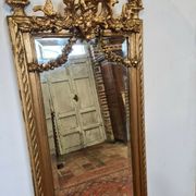 Miroir avec un ange en bois doré et stuc 166x61cm