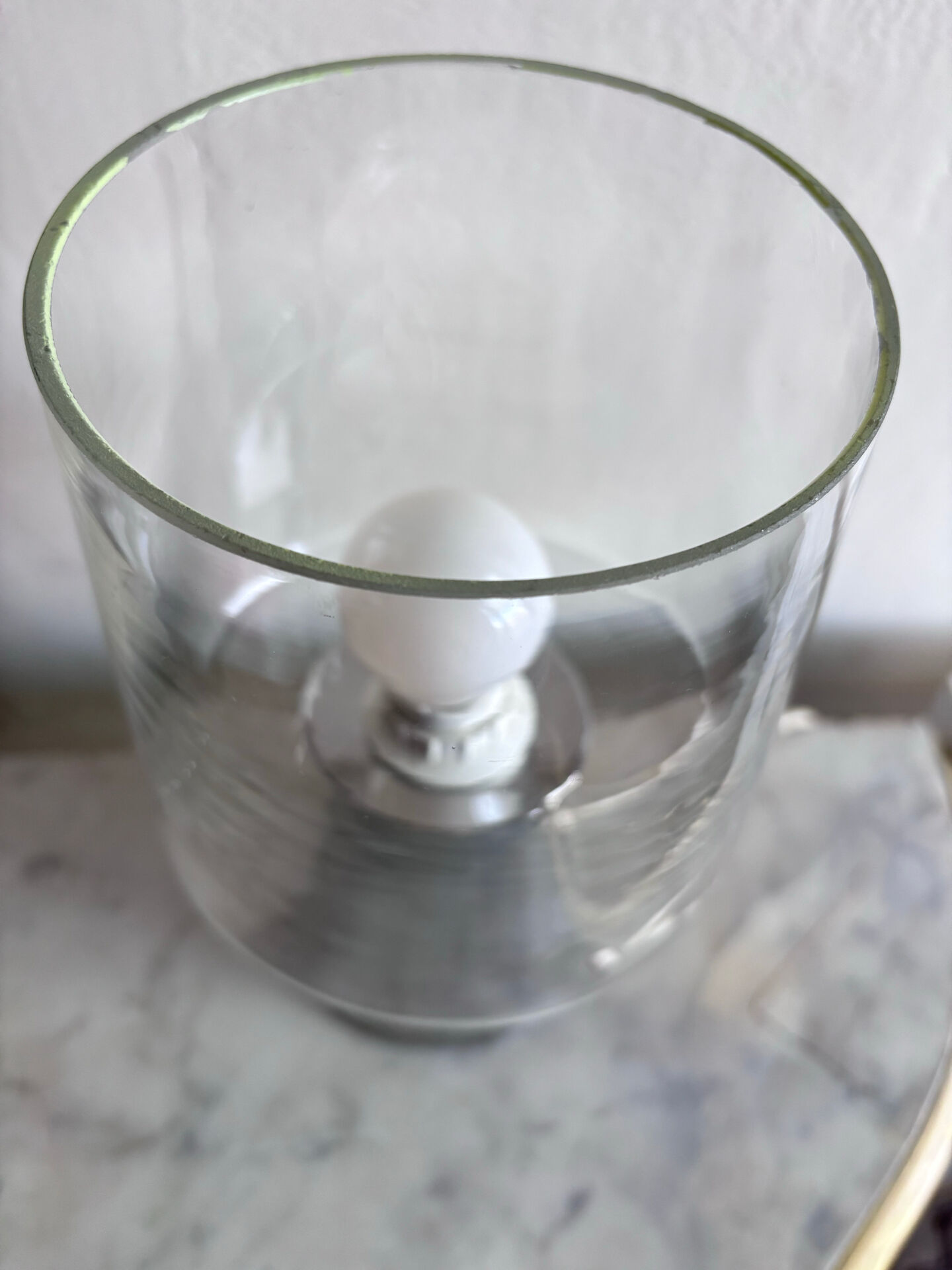 Vintage table lamp in silvered glass, mercury style, and transparent cylinder.