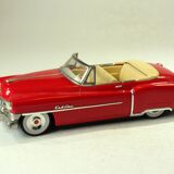 Red Cadillac 50s model car, made of metal, vintage from the 1970s