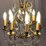 Gilded brass cage chandelier and glass tassels