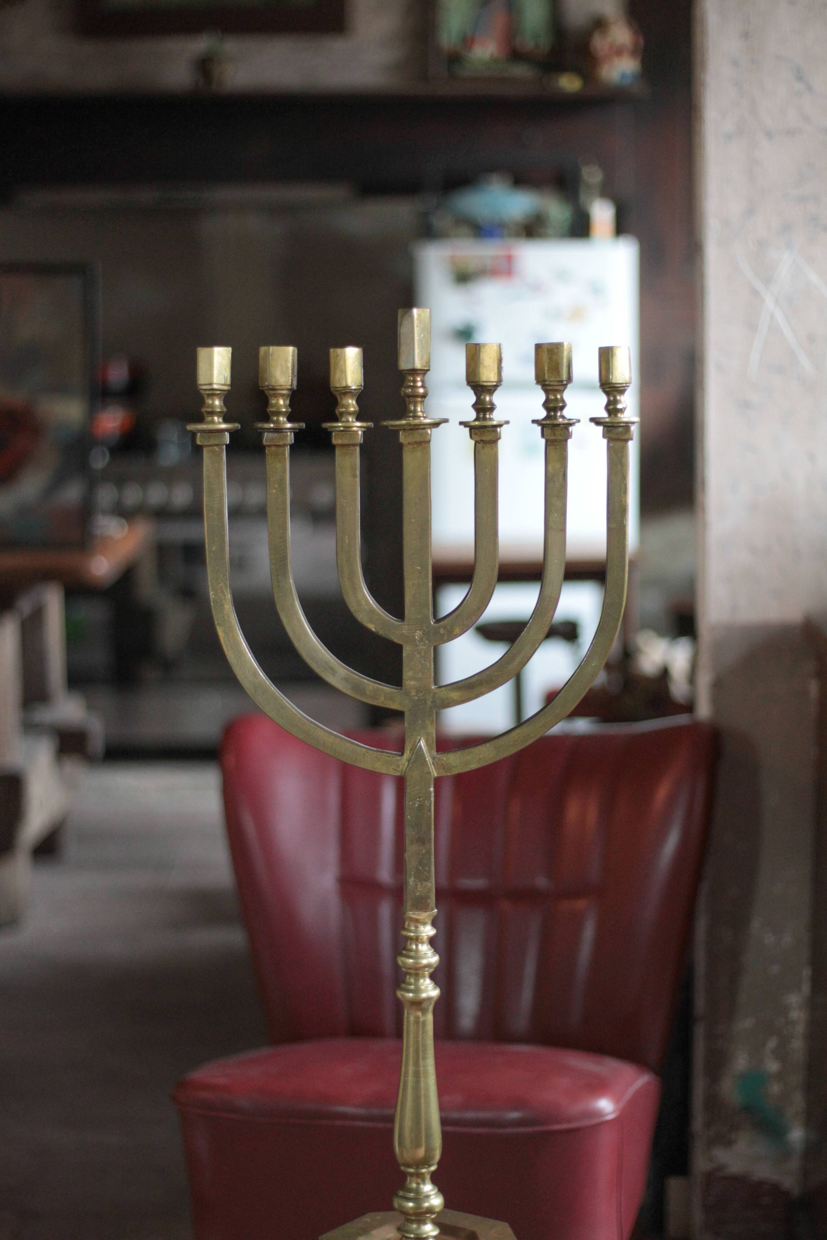 Golden bronze chandelier with seven arms, Menorah, candlestick on a stand, candelabrum.
