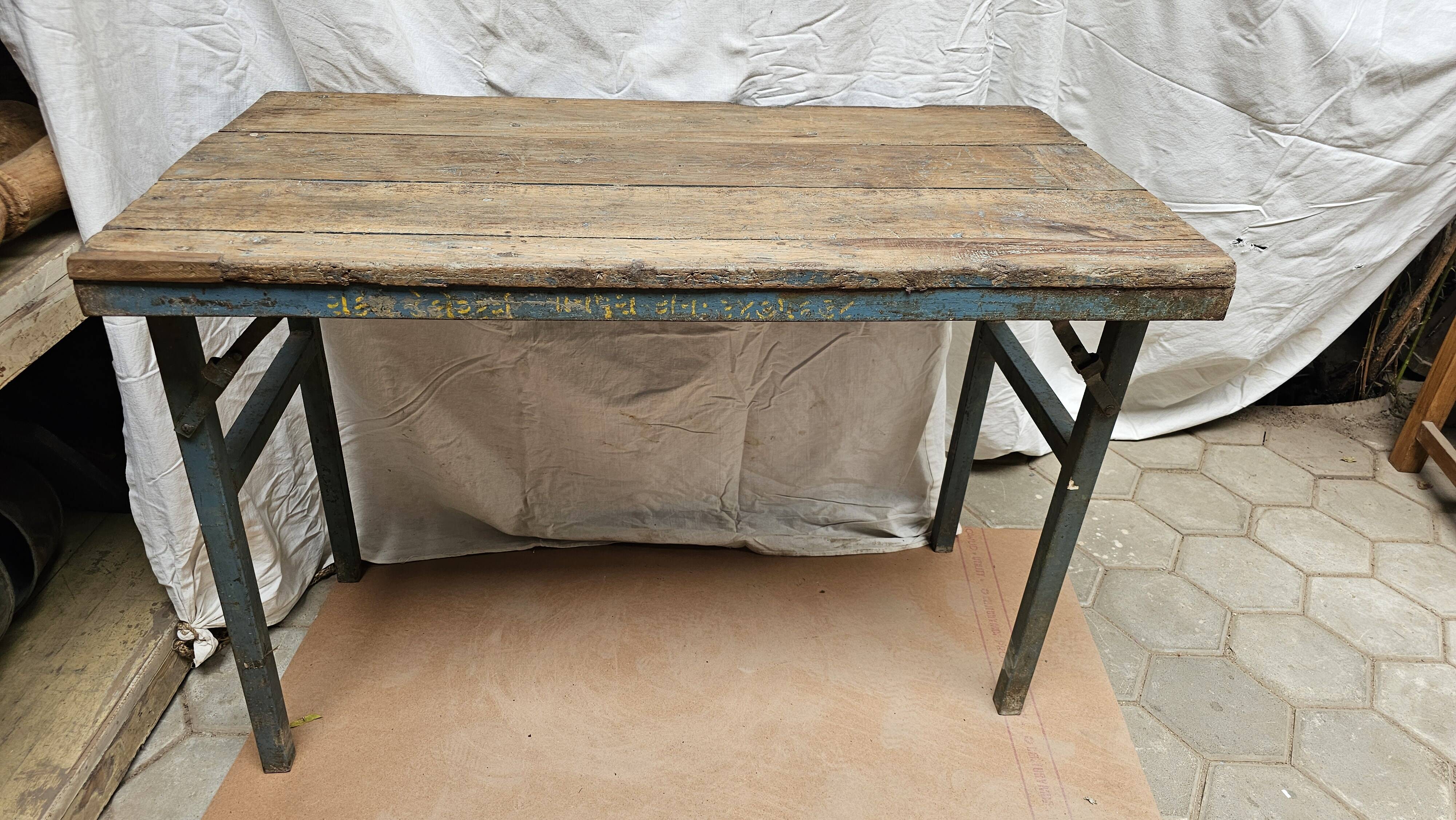 Folding workshop table in teak and wrought iron