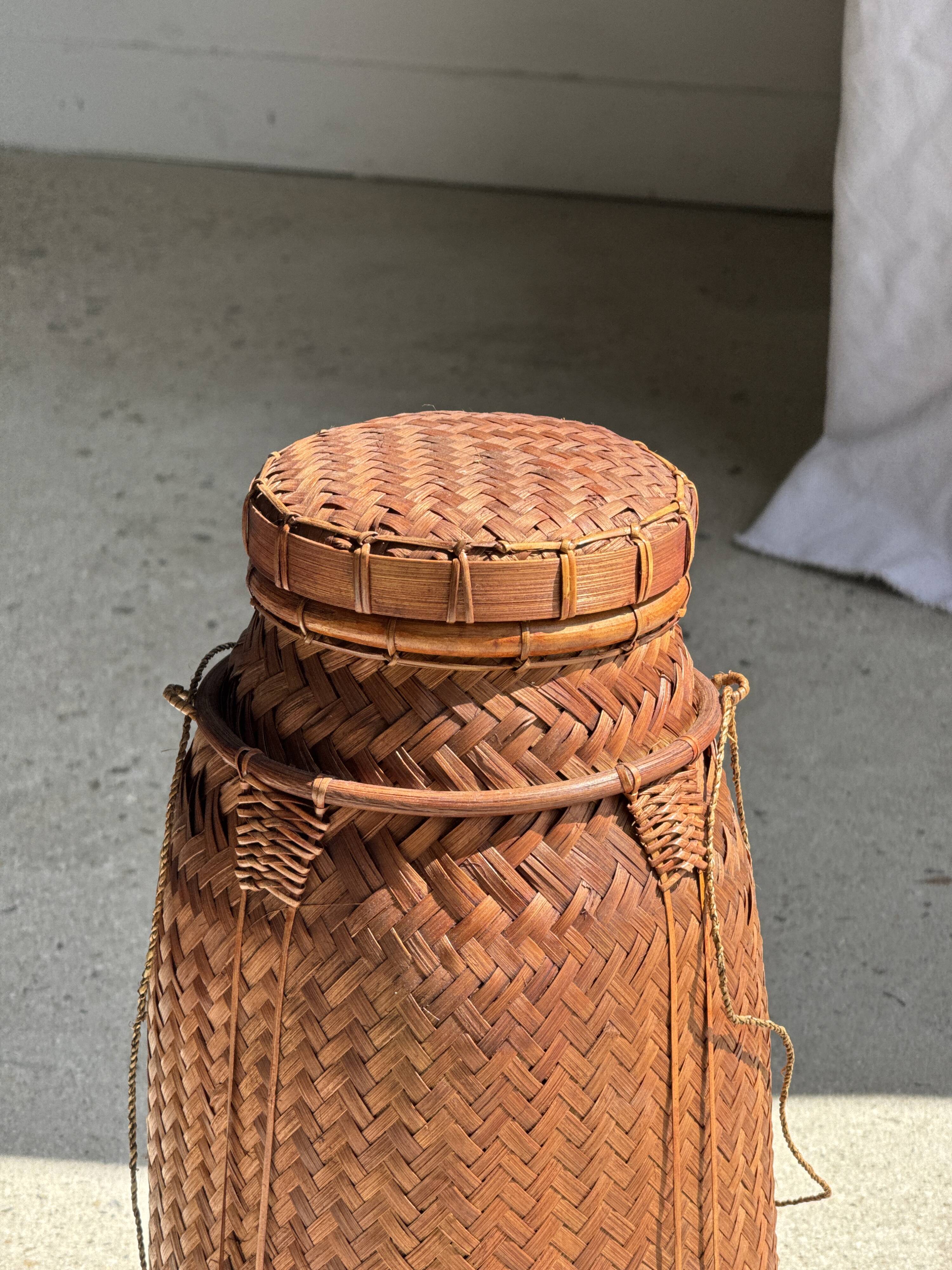 Small traditional Balinese basket with cords H47 D19 0.5kg