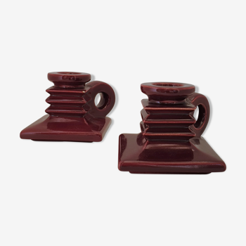 Pair of art deco candlesticks in bordeaux ceramics