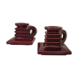 Pair of art deco candlesticks in bordeaux ceramics