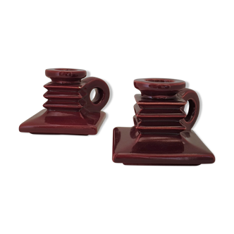 Pair of art deco candlesticks in bordeaux ceramics