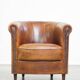 Brown leather club chair