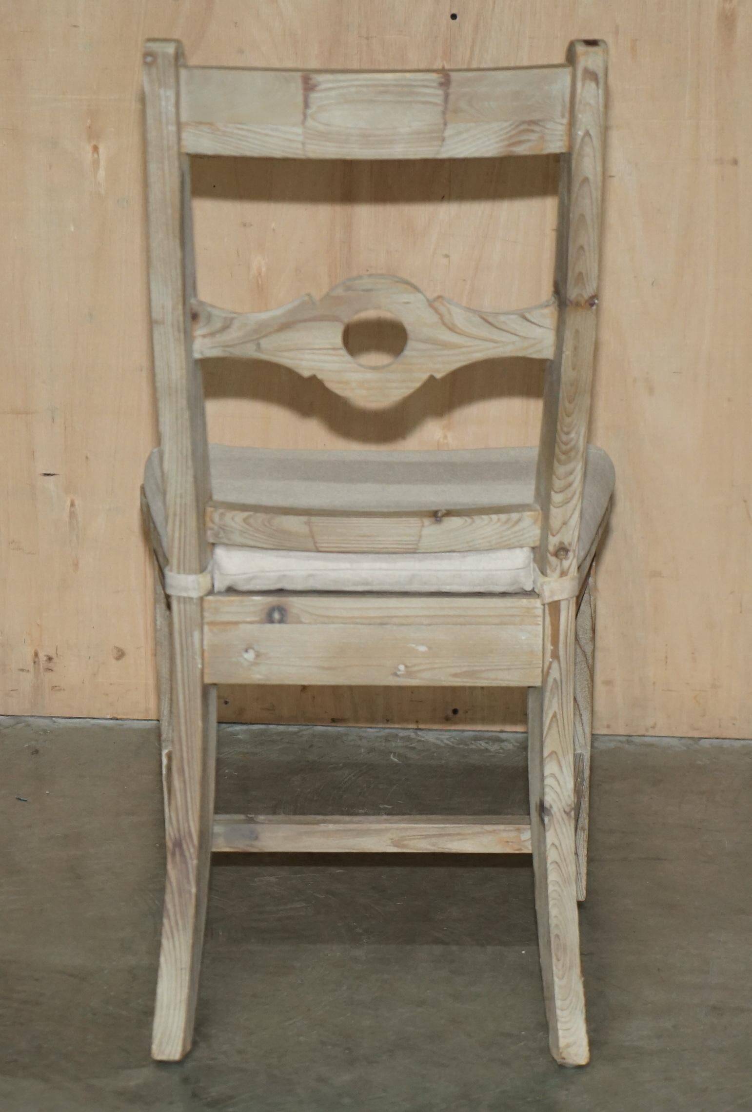 Pair of Swedish-style accent chairs in recycled pine with upholstered seats.