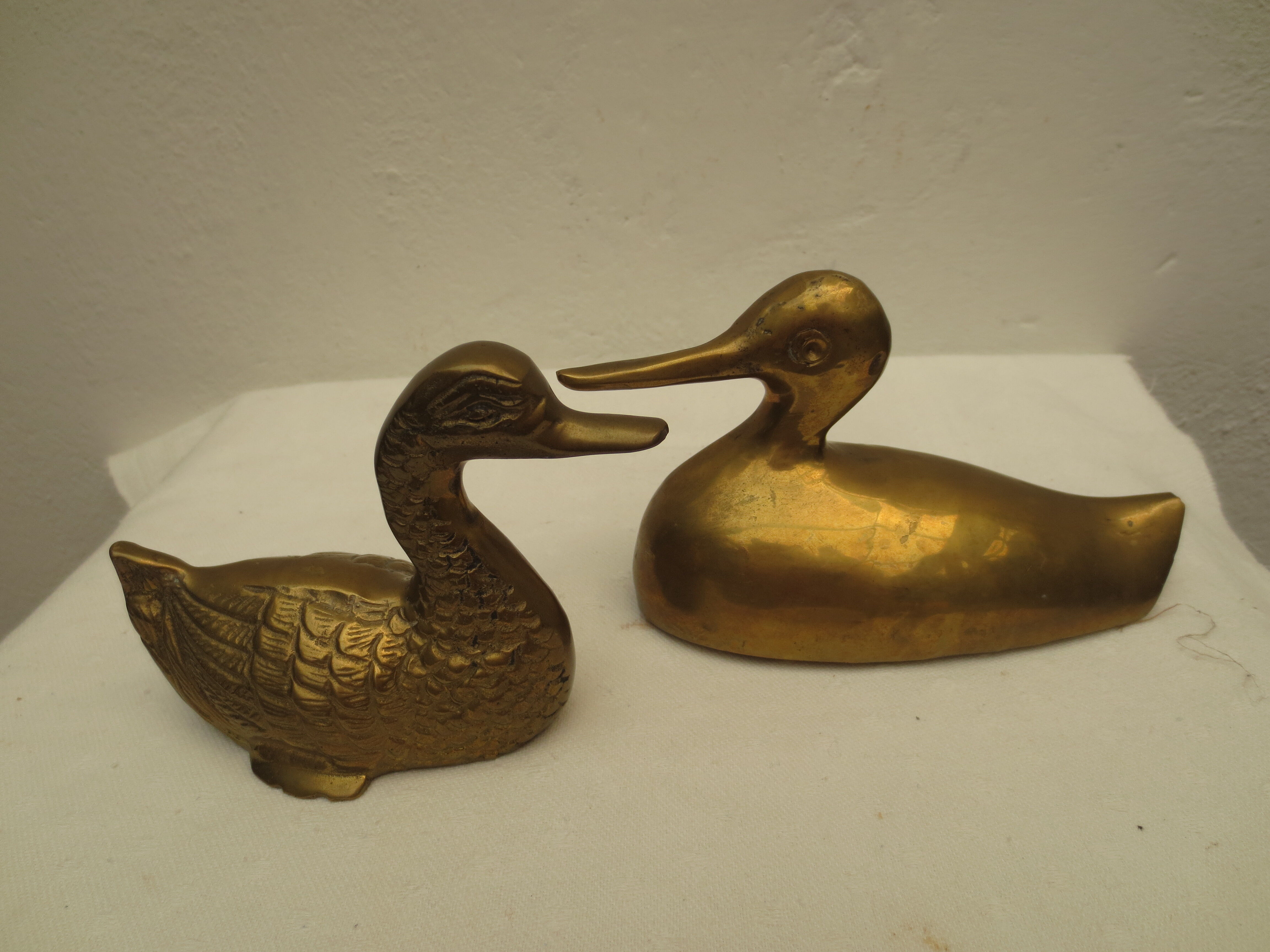 Vintage brass duck duo