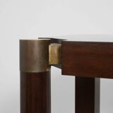 Pair of mahogany and brass consoles, 1970s.