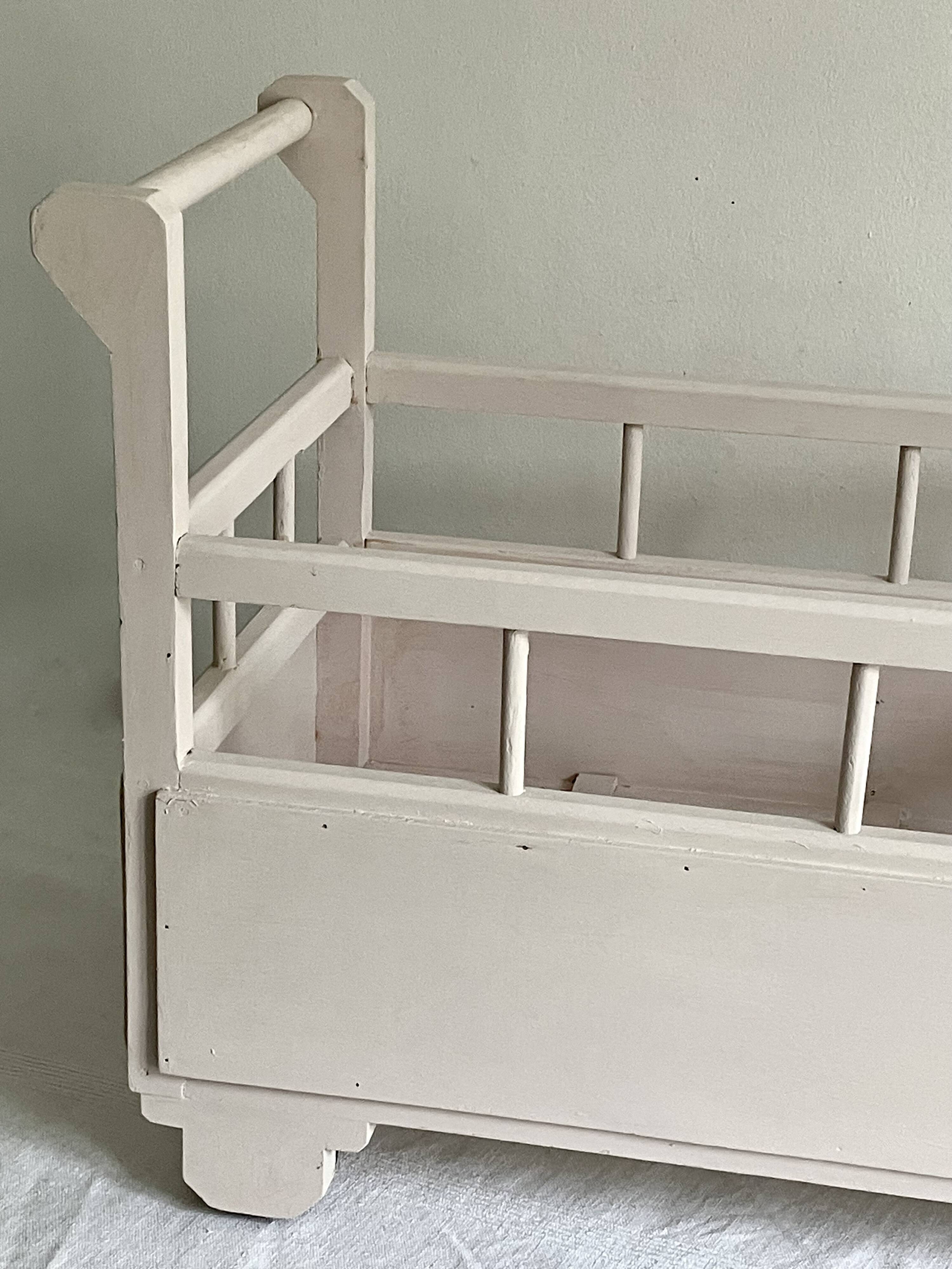 Old toy, doll's bed, caravan bed