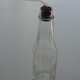 Old bottle with glass pipette