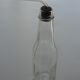 Old bottle with glass pipette