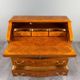 Louis XV style writing desk with a drop-leaf, made of veneer and marquetry, 19th century.