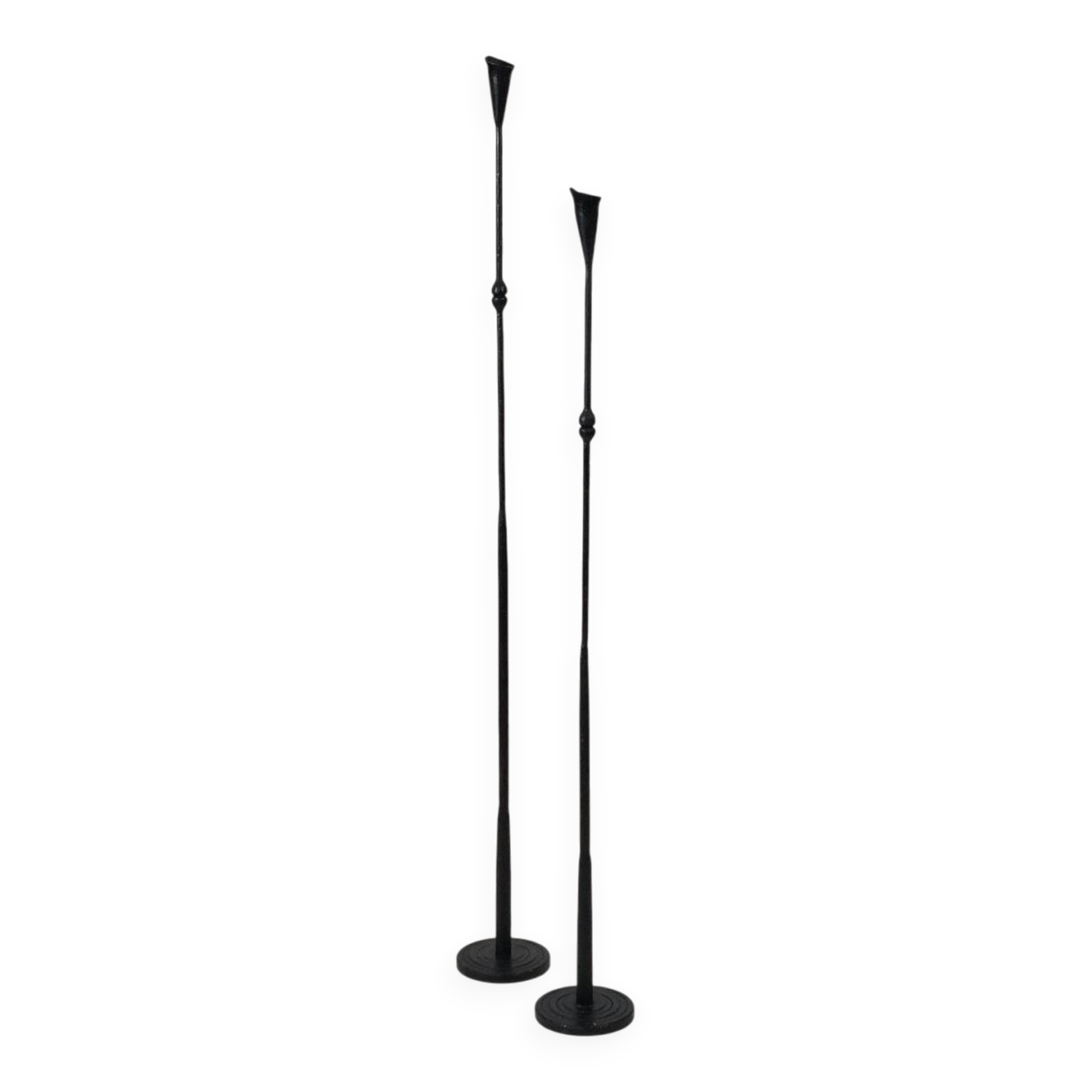 A pair of beautiful and exquisite vintage wrought iron candlesticks from the mid-century.