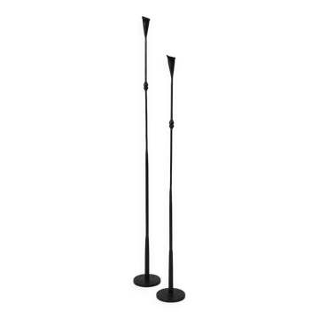 A pair of beautiful and exquisite vintage wrought iron candlesticks from the mid-century.