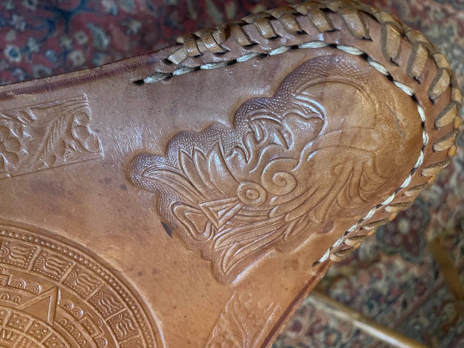 Vintage Mexican tripod stools in bamboo and leather.
