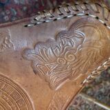 Vintage Mexican tripod stools in bamboo and leather.