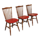 Lot de 3 chaises bois et skaï rougeTacoma par Baumann 1960