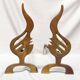 Pair of vintage design andirons bronze flame for fireplace