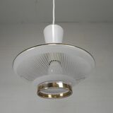 UFO-shaped pendant lamp with white glass on top and clear glass with white