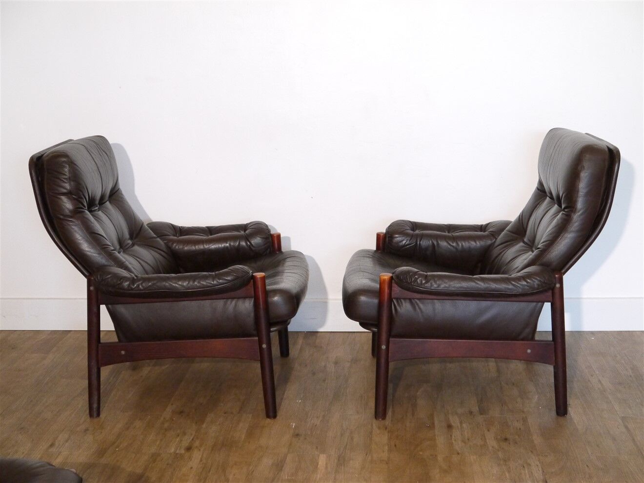 Pair of Scandinavian leather armchairs with ottomans 1970