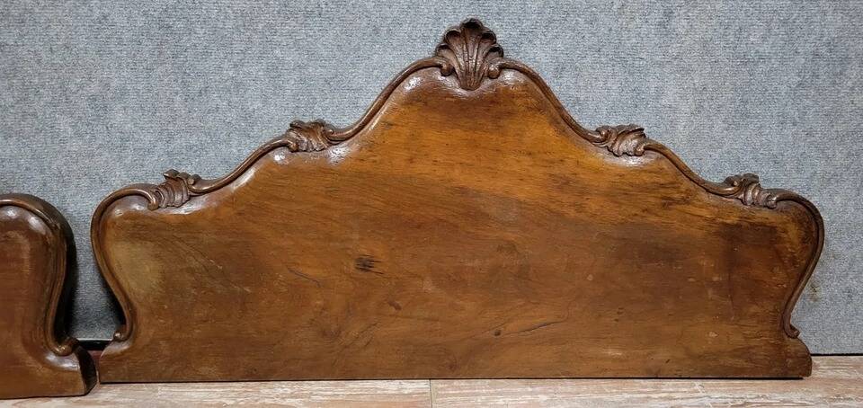 Two pair of Louis XV style walnut door tops from the late 19th century