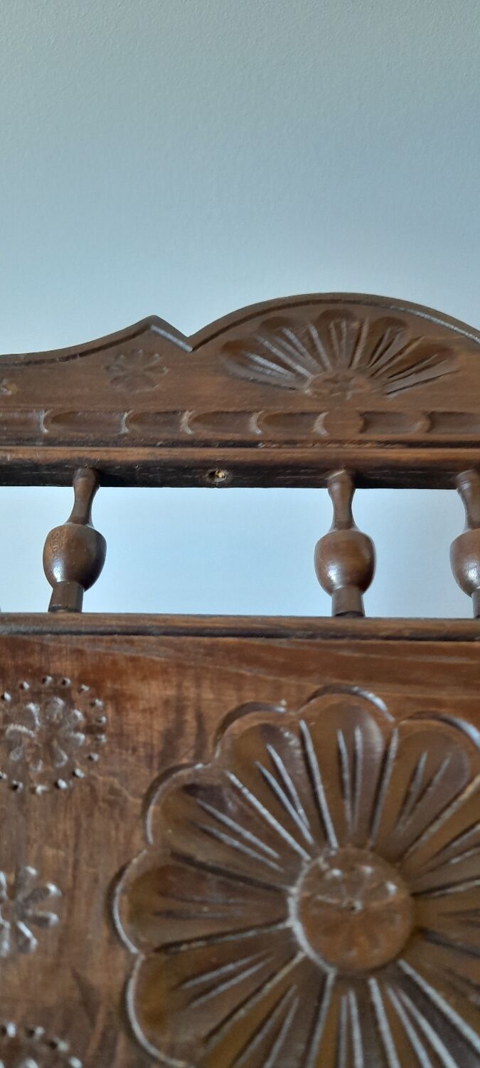 Carved wooden dolls cradle