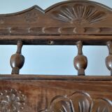 Carved wooden dolls cradle