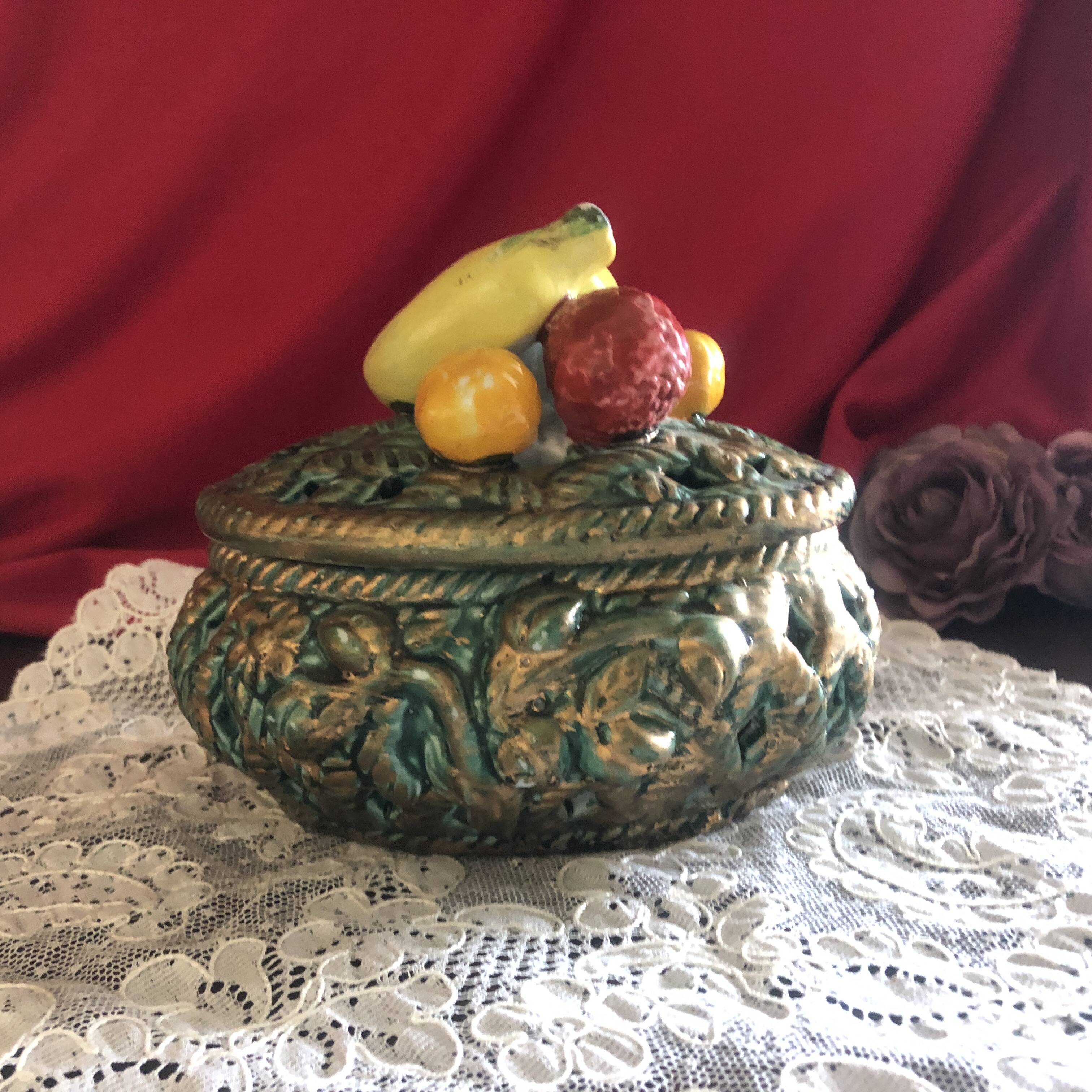 Openwork earthenware candy box with fruit slip