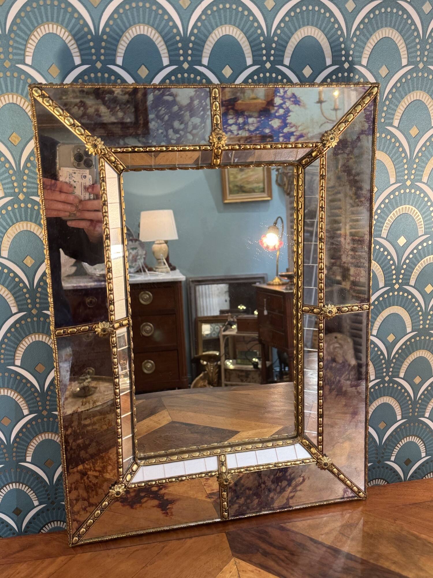 Vintage Venetian mirror with a frame from around 1970.