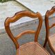 2 Louis Philippe caned chairs from the 19th century in solid wood.