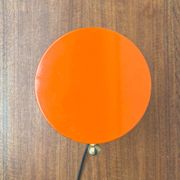 Mid-century minimalist orange table lamp, Italy, 1960s.