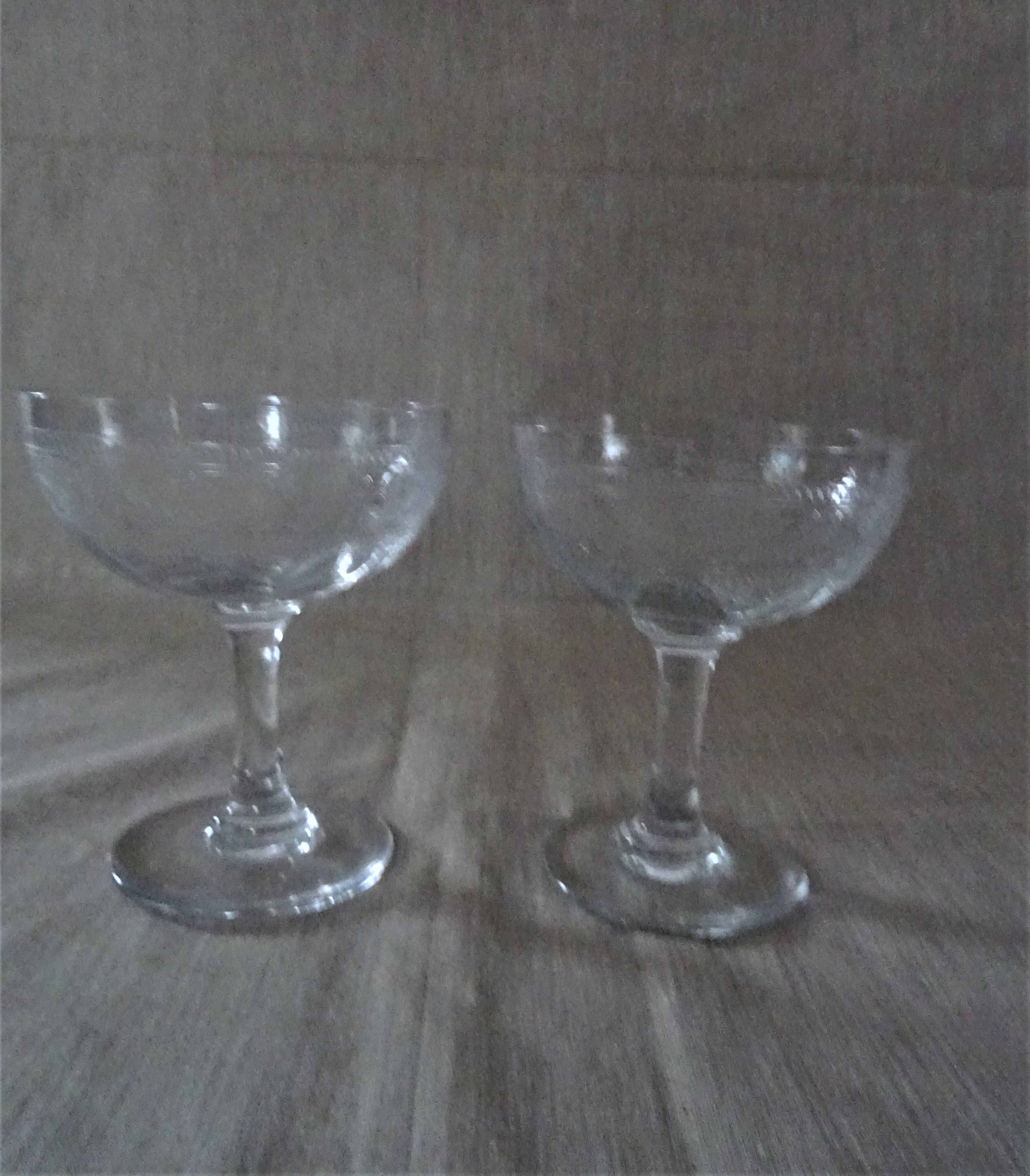Pair of old crystal champagne glasses wide frieze right foot